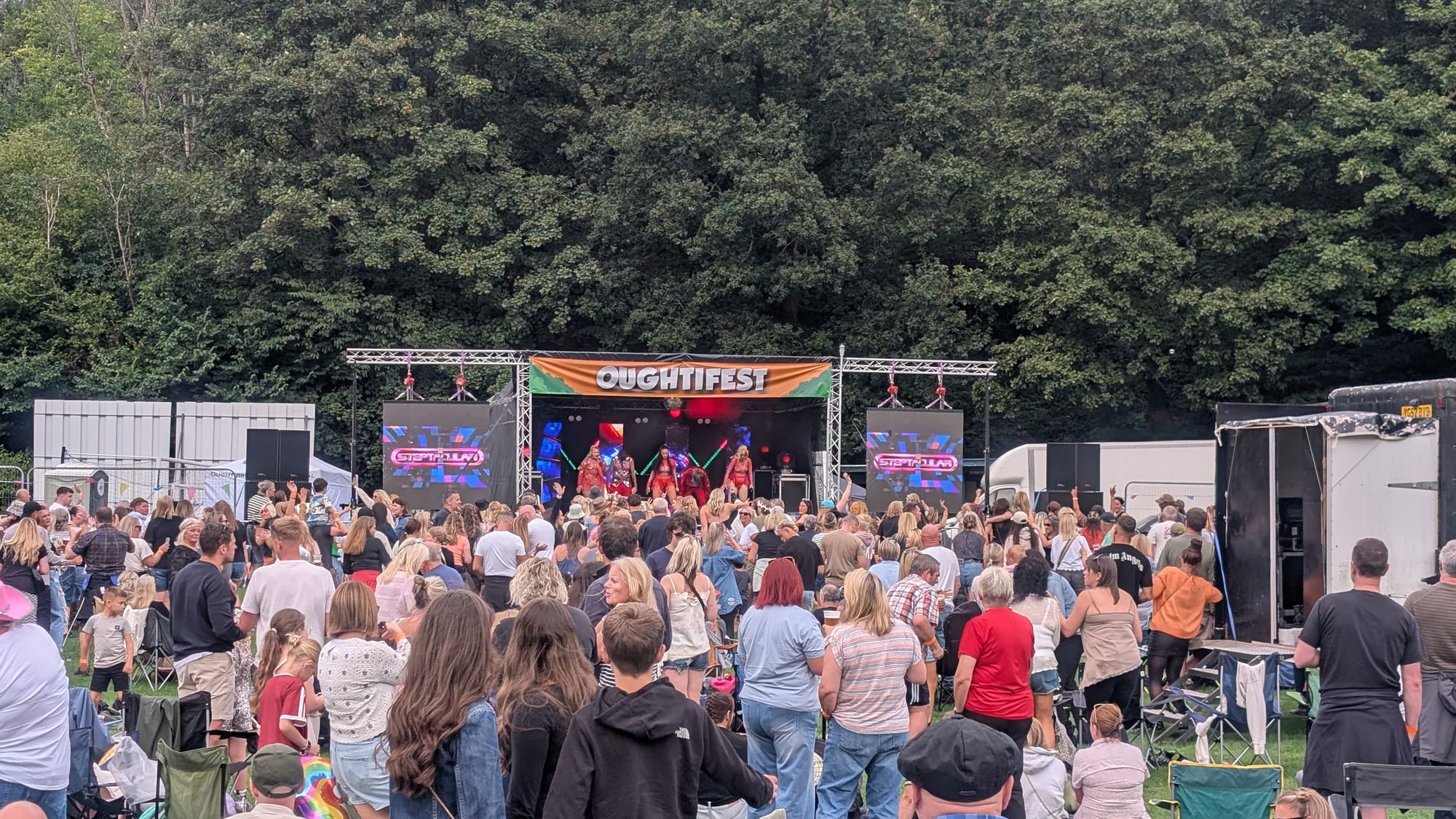 Oughtifest audience facing the stage during the real event.